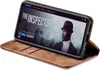 A smartphone in a brown flip case is displayed on a white background, showing a movie streaming interface on its screen. Produktbild-Vorschau