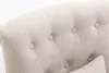 Close-up of the tufted fabric of a chair or sofa, showing buttons and textured material. Produktbild-Vorschau