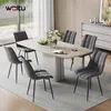 A dining room set with a table and chairs, decorated with flowers and fruit. Produktbild-Vorschau