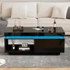 A modern living room scene with a black coffee table with blue LED lighting in front of a white sofa. Produktbild-Vorschau