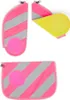 Three pieces of a pink and gray striped accessory with reflective elements, one of which is partially open and shows a yellow interior. Produktbild-Vorschau