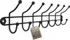 A black metal coat rack with seven hooks is shown against a white background. A small, light brown tag with the brand name 'KADAX' and an illustration of hooks is attached to one of the hooks. Podgląd zdjęcia produktu