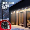 A winter scene with a house decorated with icicle lights, and a close-up of a coiled string of lights with a remote. Produktbild-Vorschau