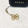 Ciondolo Guess 4G in metallo con logo Anteprima dell’immagine prodotto 8