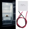 A split image showing an open refrigerator on the left and a thermoelectric generator module on the right. Podgląd zdjęcia produktu