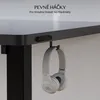 A close-up of a black standing desk with a hook holding a pair of white headphones. Text is overlaid on the image. Náhled obrázku produktu