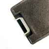 Close-up view of a charcoal filter for an appliance. Voir les images du produit