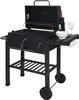A black charcoal grill with its lid open, placed on a white background. Accessories like a wine bottle, a bowl, and a wine glass are placed on the side table. Podgląd zdjęcia produktu