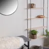 A hallway or living room area with a bench and shelves. Anteprima dell’immagine prodotto