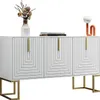 A white sideboard with gold accents and decorative items on top, presented against a white background. Voir les images du produit