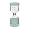 A 30-minute hourglass with mint green sand and a mint green base and lid. Voir les images du produit