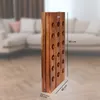 A wooden wine rack is shown in a living room setting. Produktbild-Vorschau