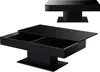 A black high-gloss coffee table with two open storage compartments is shown from a slightly elevated angle. A second, smaller image of the same table in its closed state is positioned above and to the right. Produktbild-Vorschau