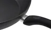 A close-up shot of the handle and rim of a frying pan. Produktbild-Vorschau