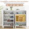 A white shoe cabinet with multiple shelves displaying various types of shoes and boots. Decorative elements like a vase with flowers and a hat are on top. Produktbild-Vorschau
