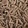 A close-up, overhead view of a pile of brown pellets. Produktbild-Vorschau