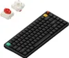 A black Nuphy Air75 V3 mechanical keyboard with some colorful keycaps and switches shown separately. Voir les images du produit