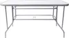 A white rectangular table with a metal frame, shown from the front. Produktbild-Vorschau