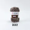 A ball of brown, fluffy yarn is shown against a white background. Text labels are visible on the yarn's packaging. Produktbild-Vorschau