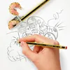 A hand is holding a pencil and drawing a car on a piece of paper. There is also a pencil sharpener with pencil shavings. Voir les images du produit