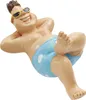 A figurine of a man relaxing on a lounge chair.