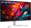 A close-up view of an LG UltraFine Display monitor with a colorful abstract wallpaper displayed on the screen. Produktbild-Vorschau