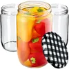 Three glass jars, one filled with red and yellow peppers, and a black and white checkered lid. Podgląd zdjęcia produktu