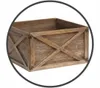 A close-up view of a wooden storage box with a criss-cross design on the side. Voir les images du produit