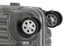 A close-up view of the wheels and corner of a gray suitcase. Podgląd zdjęcia produktu
