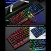 A gaming keyboard and mouse set with rainbow backlighting, shown in multiple close-up views. Voir les images du produit
