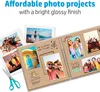 A spread of a photo album with various travel photos and decorative elements. Anteprima dell’immagine prodotto