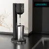 A black milkshake maker with a silver cup in a modern kitchen setting. Náhľad obrázku produktu