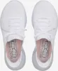A top-down view of a pair of white Skechers Slip-ins shoes. Anteprima dell’immagine prodotto