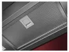 Close-up view of the perforated metal filter and control panel of a range hood. Produktbild-Vorschau