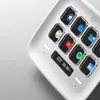 A close-up view of a white Elgato Stream Deck Neo with illuminated app icons on a light gray and white background. Náhled obrázku produktu