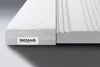 A close-up view of a mattress topper, showing its layered construction and texture. Náhled obrázku produktu
