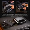 A multi-functional sandwich maker with interchangeable plates shown with its accessories. Náhľad obrázku produktu
