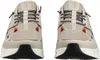 A front view of a pair of beige Skechers sneakers. Voir les images du produit