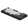 A black mechanical keyboard with white and gray keycaps, shown from a diagonal angle against a white background. Produktbild-Vorschau