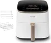 A white Cosori air fryer with a black top control panel and gold accents, displayed with accessories. Náhľad obrázku produktu