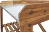 Close-up of a wooden potting table with a metal top. Náhled obrázku produktu
