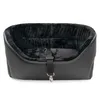 A black dog car seat with plush lining and a safety strap. Anteprima dell’immagine prodotto