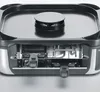 Close-up view of a raclette grill. Produktbild-Vorschau
