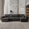 A modern living room with a large U-shaped sofa. Voir les images du produit