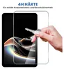 A hand is holding a key to demonstrate the scratch resistance of a tablet screen protector. Produktbild-Vorschau