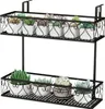 A two-tiered black metal shelf holding several potted succulents. Produktbild-Vorschau