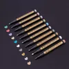 A set of metallic marker pens arranged diagonally on a black surface, with small heart-shaped color swatches next to them. Produktbild-Vorschau