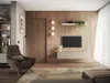 A modern living room with a TV mounted on a wooden wall, a lowboard beneath it, and a comfortable armchair. Produktbild-Vorschau