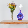 Aroma diffuser and a vase of flowers on a wooden desk. Voir les images du produit