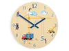 A wooden clock with a construction theme, featuring a crane, truck, excavator, and cartoon figures. Produktbild-Vorschau